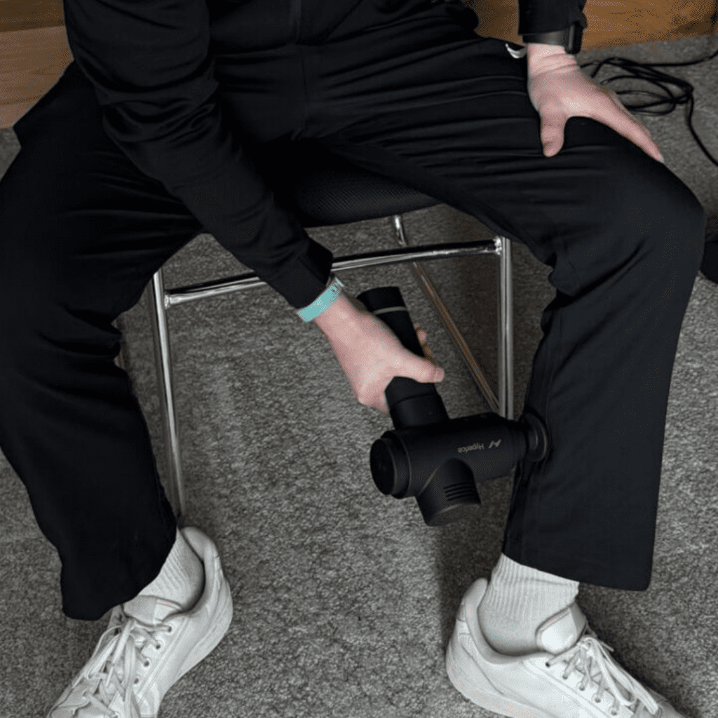 Person using massage gun at Northcote Aquatic